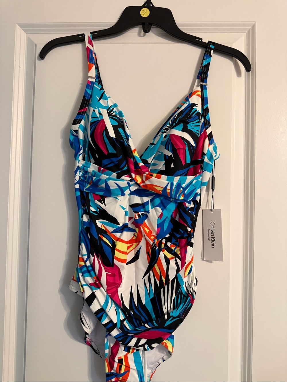 Calvin Klein Women’s One-Piece Swimsuit in Blue, White, Pink, Orange
New